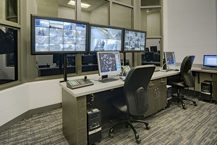 Computer Monitors Line Desks in the Control Room